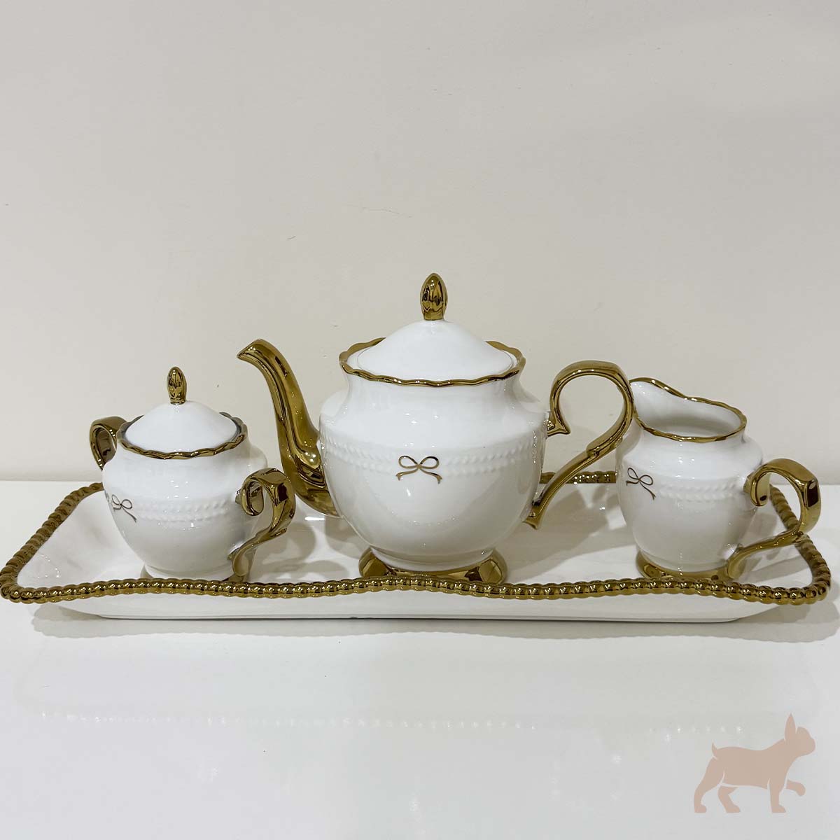 Juego de té de porcelana con moño