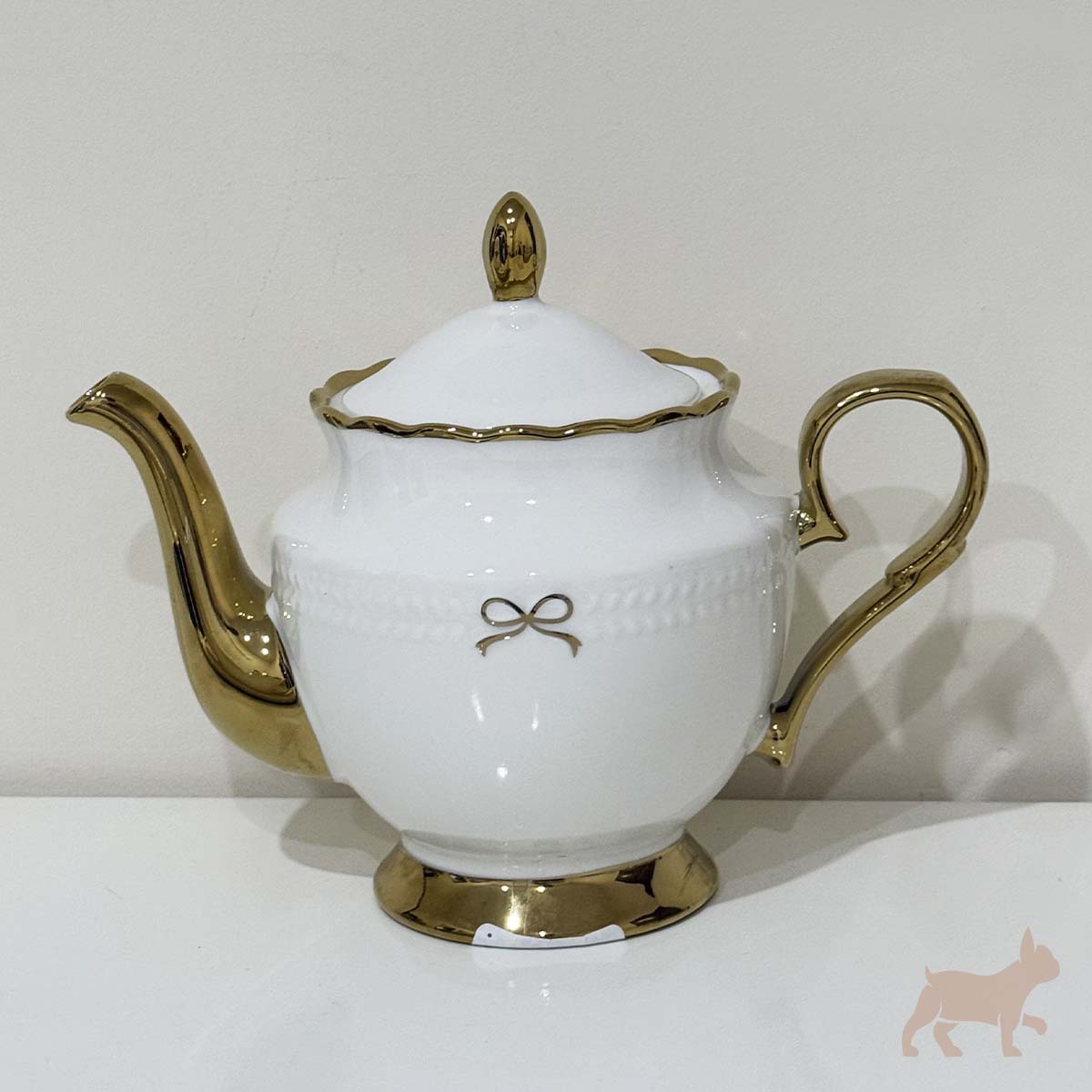 Juego de té de porcelana con moño