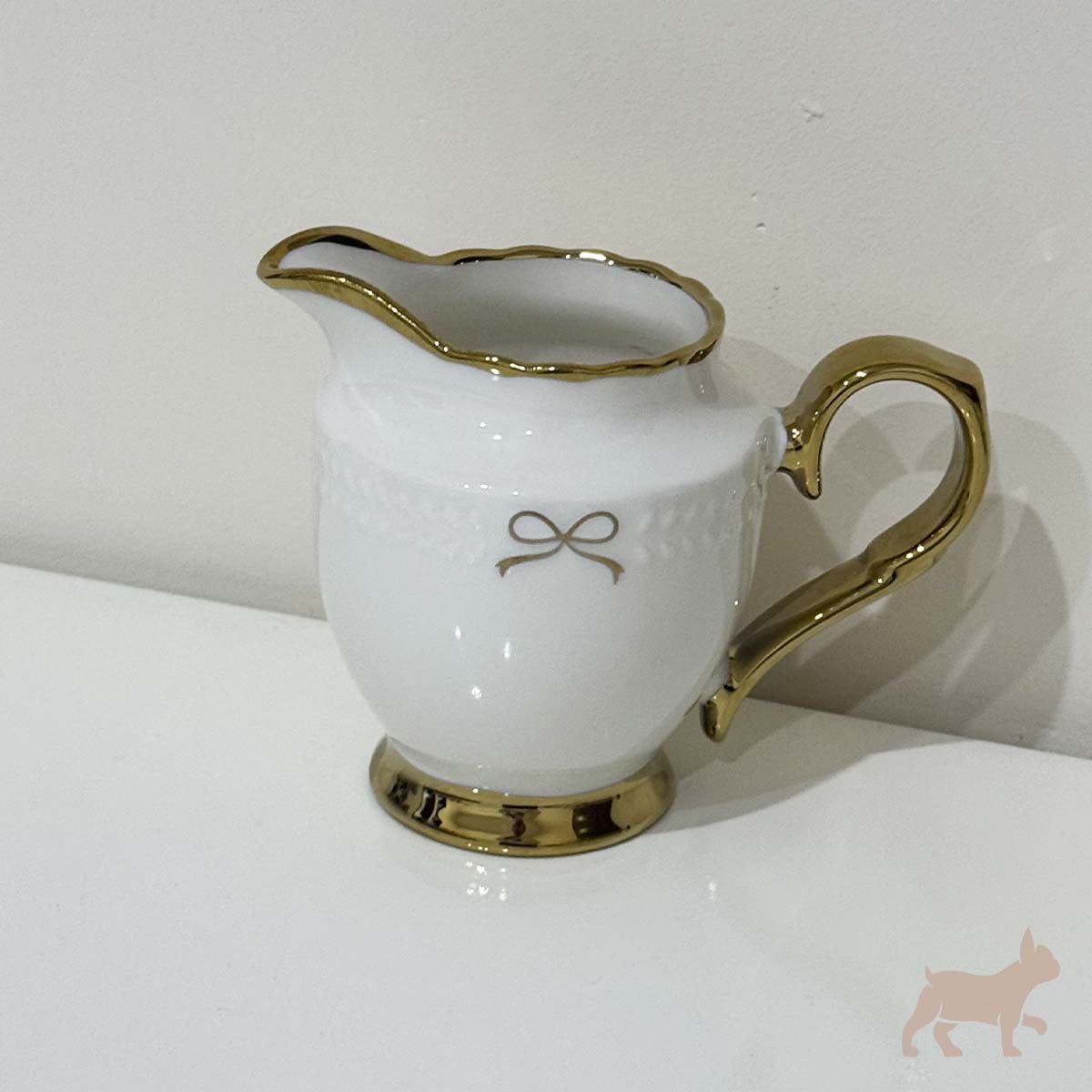 Juego de té de porcelana con moño