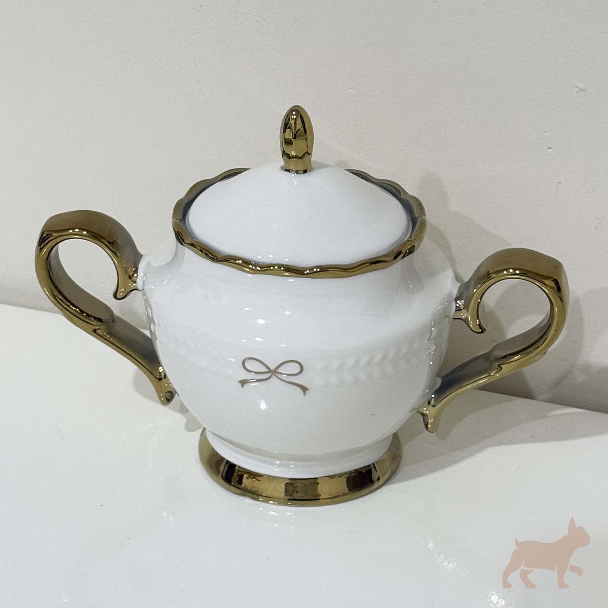 Juego de té de porcelana con moño
