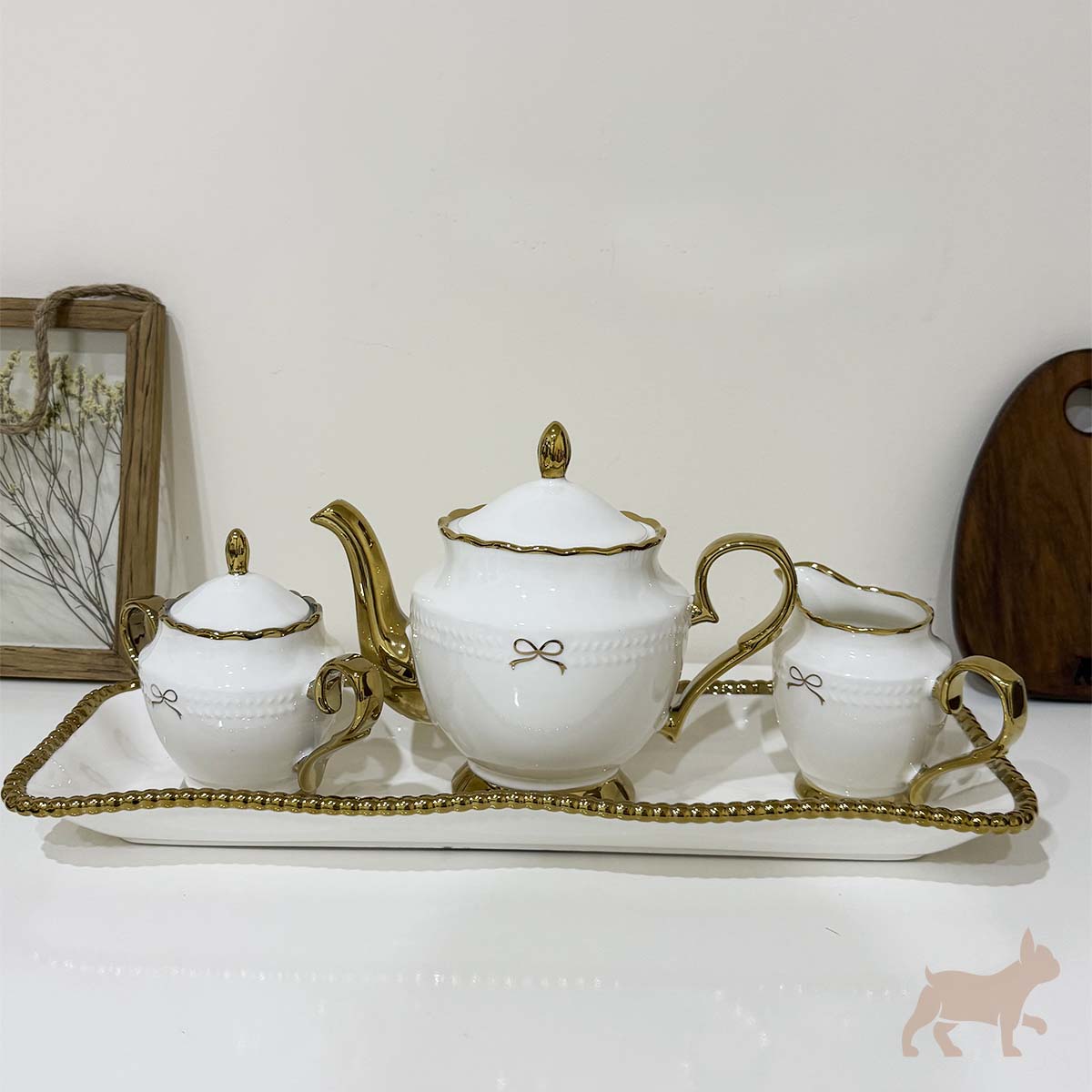 Juego de té de porcelana con moño