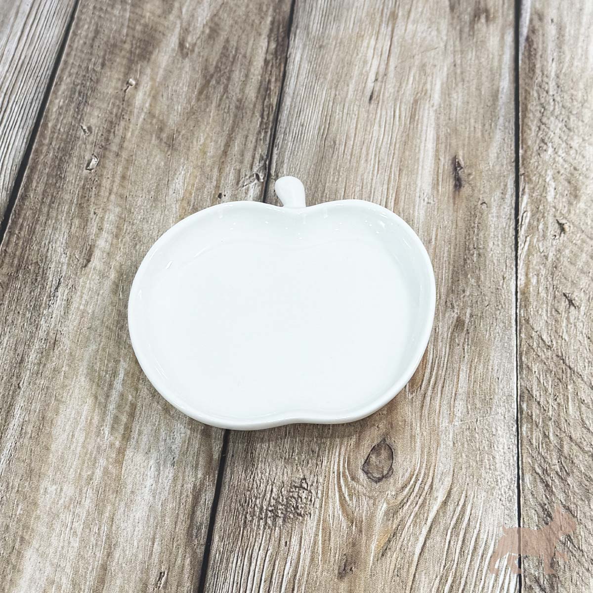 Plato en forma de manzana