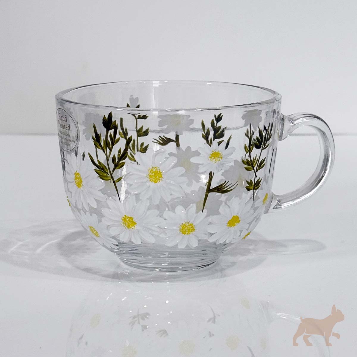 Taza de cristal con flores
