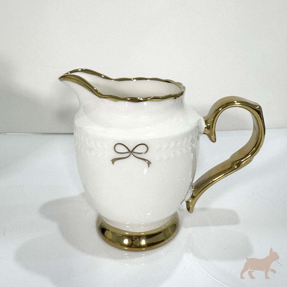 Juego de té de porcelana con moño