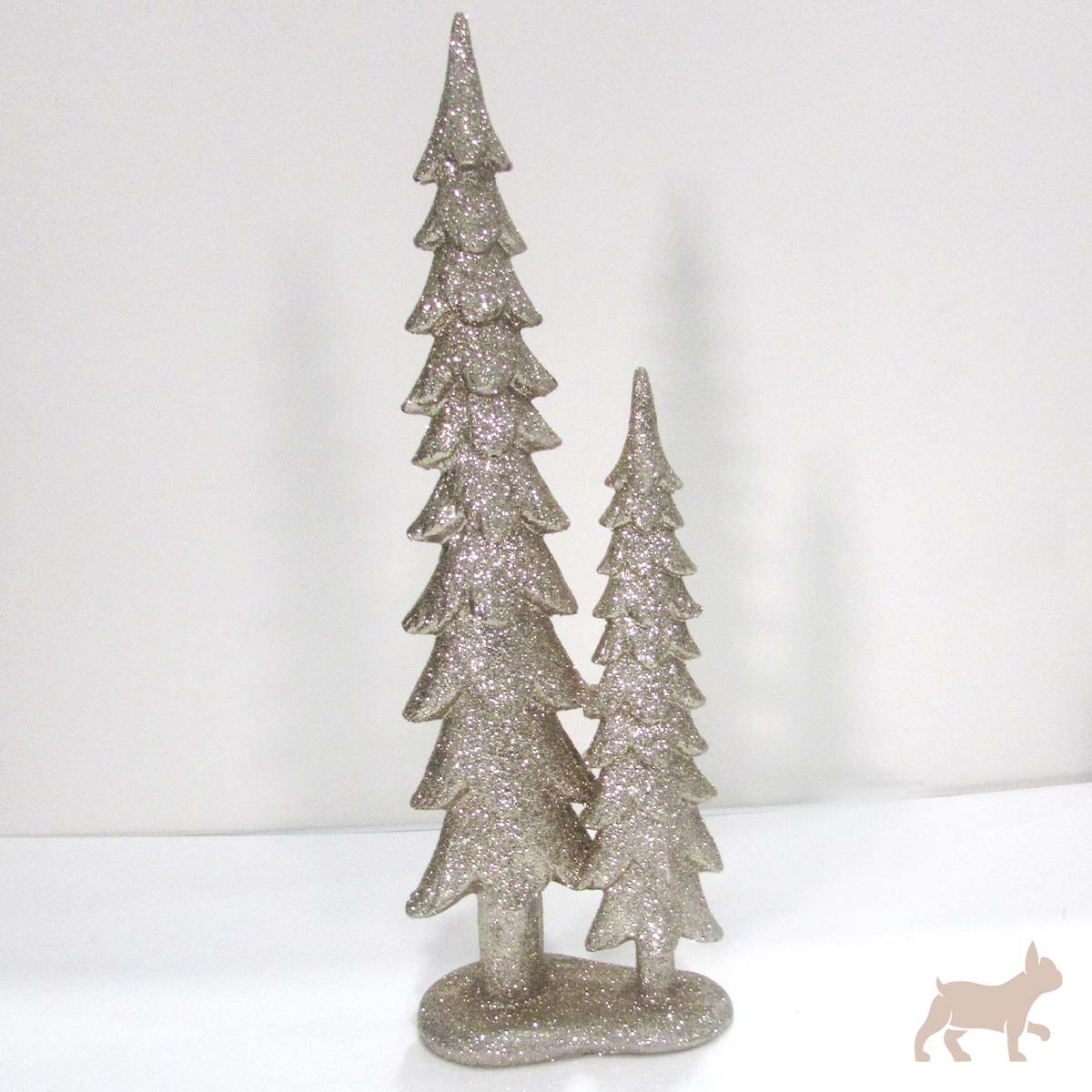 Par de pinos con brillos