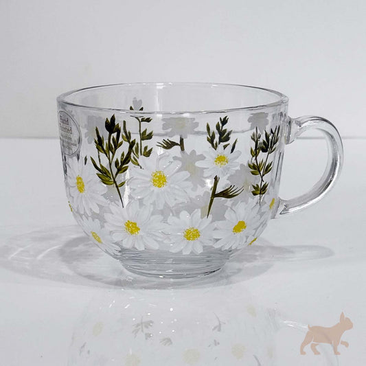 Taza de cristal con flores